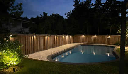 BD Lighting outdoor lighting and landscape lighting installed along a deck and fence for a Oakville backyard