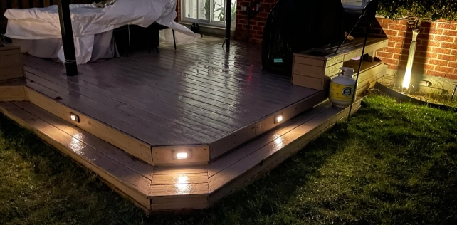 Step and stair lights improving outdoor safety on Toronto home — low-voltage landscape lighting by BD Lights
