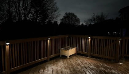 Deck perimeter edge lighting defining boundaries of an elevated Toronto backyard deck at night — BD Lights