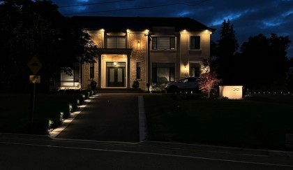 Driveway and transition pathway lighting defining edges and separating walking zones at a Toronto property — BD Lights