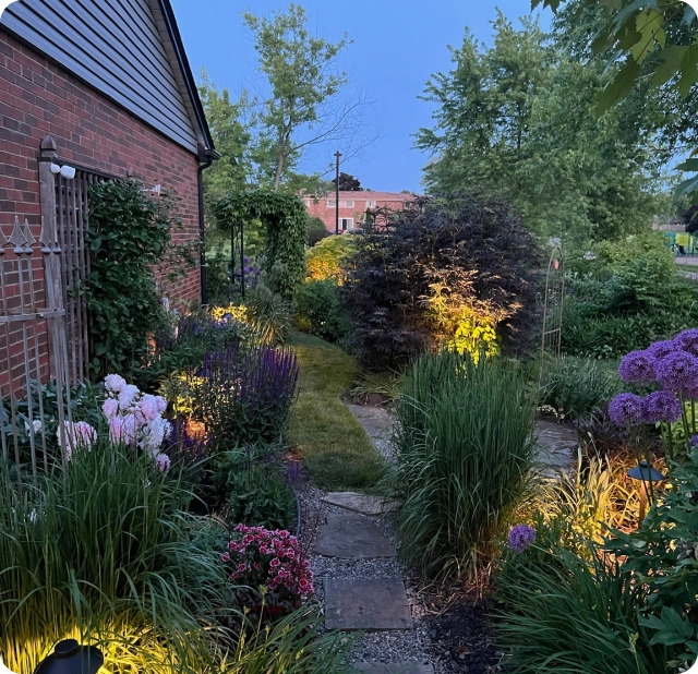 Low-voltage pathway lighting along a garden walkway at a Toronto residential property — BD Lights