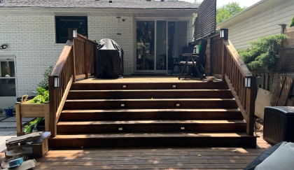 LED stair riser lighting installed on wood deck steps improving safety at a Toronto home — BD Lights deck lighting